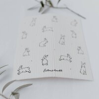 Schwammtuch mit Kaninchen Motiv dekorativ arrangiert