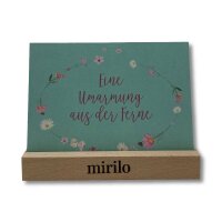 Postkarte mit Blumenkranzmotiv und Text eine Umarmung aus...